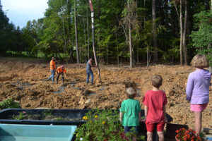 concrete being poured for school's expansion