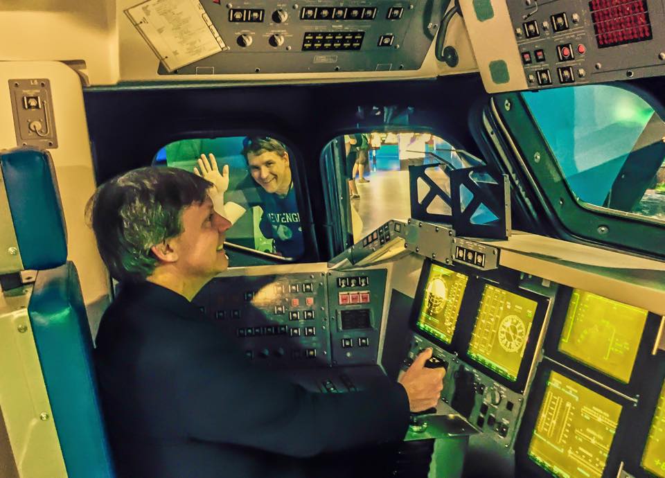 chuck pell at controls of space shuttle simulator