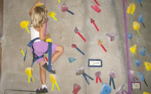 girl on climbing wall