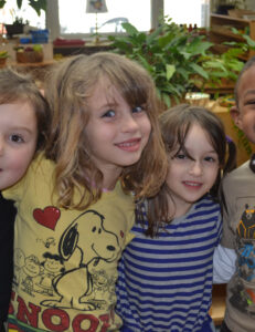 children joining in arms
