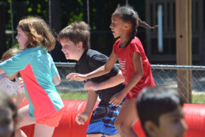 children playing at field day