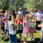 children waiting for a race at a fall picnic at The New School