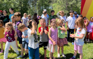 children waiting for a race at a fall picnic at The New School