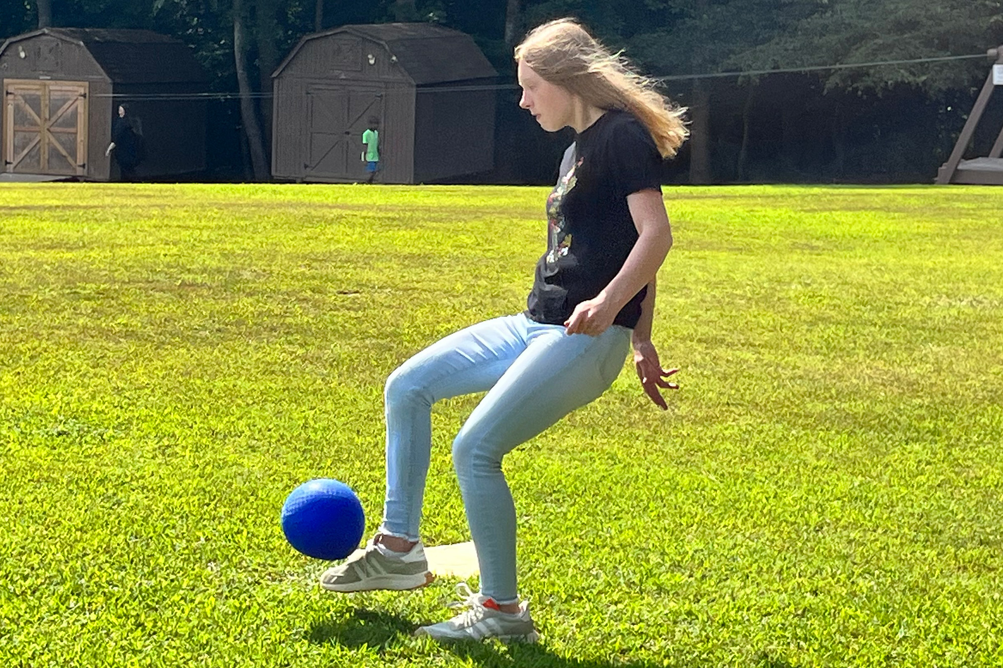 soccer club adolescent girl playing soccer in a field